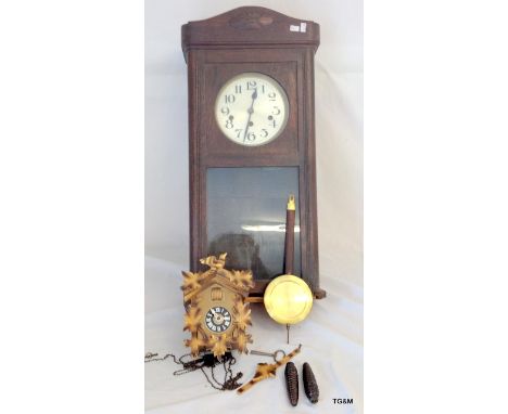 A wall clock and a cuckoo clock