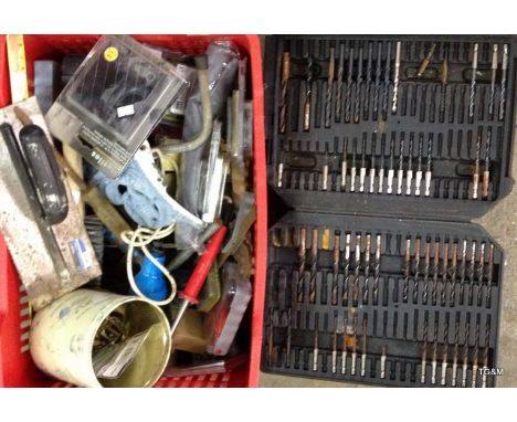 A box of mixed tools and drills