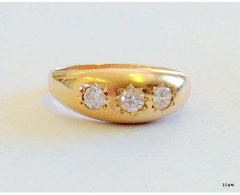 A 9ct gold man's 3 stone gypsy ring size R