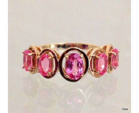 A 9ct gold pink topaz 5 stone ring size N