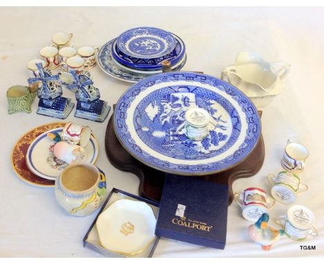 Mixed china to include Delft and Doulton 2 handled  loving cups and a wall shelf