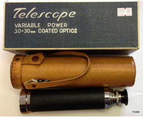 A tower variable power telescope with leather case new in its box