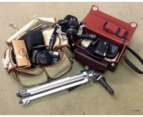A mixed lot of camera equipment