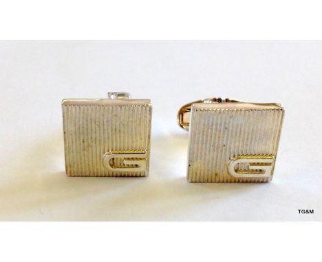 A genuine silver Gucci mens cufflinks