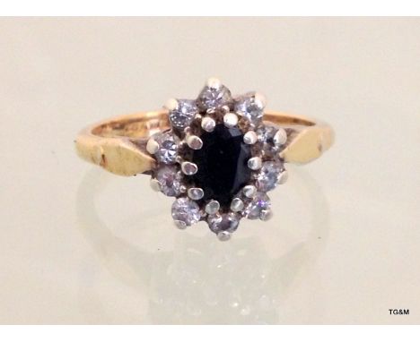 A 9ct gold and silver ladies sapphire ring size M