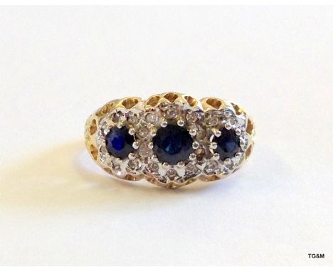 A 9ct gold ladies diamond and sapphire ring size L