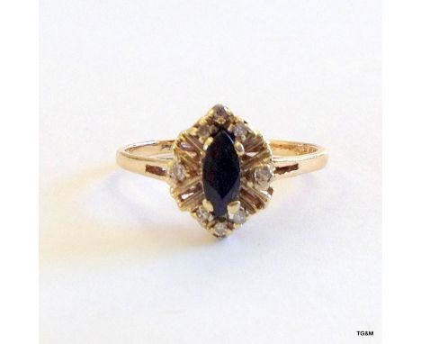 A 9ct gold ladies diamond and sapphire ring size Q