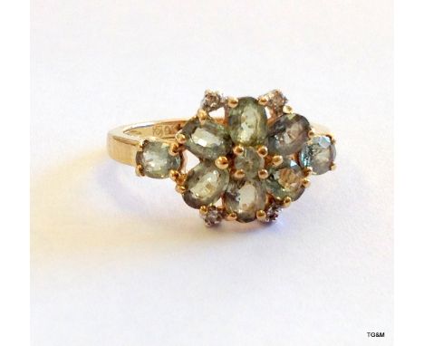 A 9ct gold and green quartz ladies ring size J