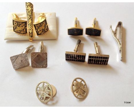 A quantity of cufflinks and tie pins, including silver