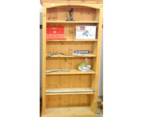 A five shelf pine bookcase