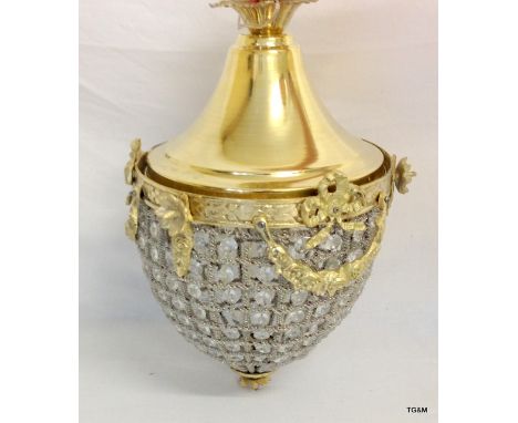 A brass swag style glass hanging light