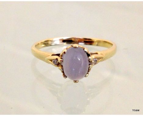 A 9ct gold diamond shoulder moonstone ring size S