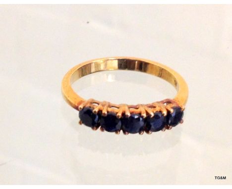 A 9ct gold ladies 5 stone sapphire ring size P