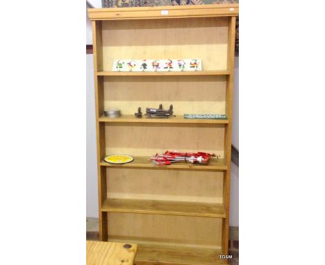 A four shelf pine bookcase