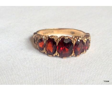 A 9ct gold antique style garnet ring size N