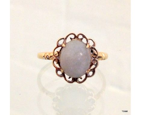A 9ct gold moonstone ring maker FKB ltd size L
