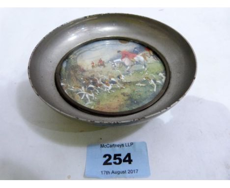 A white metal dish with glazed watercolour and gouache hunting scene signed George Wright. 4¾'' diameter