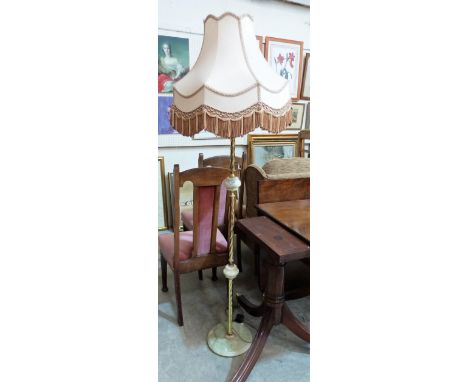 An onyx and gilt metal lamp standard