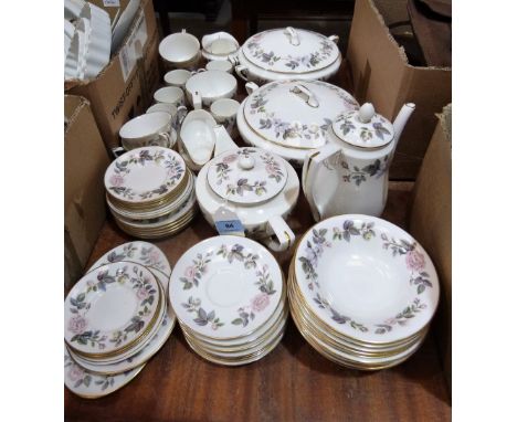 A Royal Worcester 'June Garland' part tea service and dinner service comprising 51 pieces. Teapot lid re-stuck