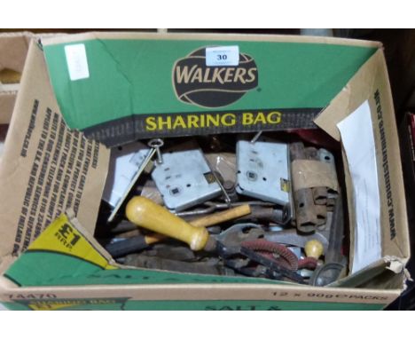 A box of tools and metalware