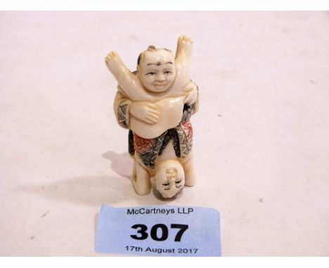 A Japanese carved ivory netsuke. 2'' high