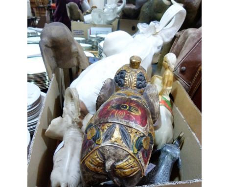 A collection of ceramic and other elephant figures
