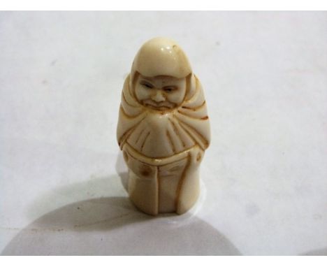 A Japanese carved ivory netsuke. Signed. 2¼'' high