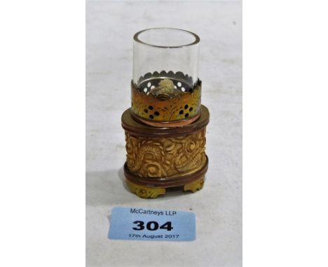 A Chinese carved ivory and gilt metal opium lamp. 3'' high