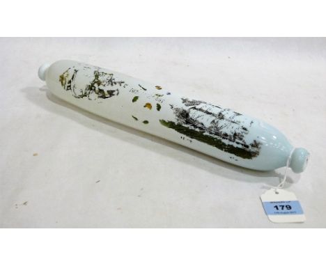 A Victorian milk glass rolling pin with traces of maritime decoration. 15¾'' long