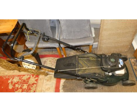 A Hayter petrol driven lawn mower powered by a Honda 4.5 engine. 
