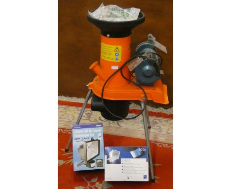 An AL-KO electric shredder, model number H1100, together with a Warco bench grinder and two security flood lights (4). 