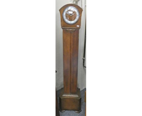 A Westminster chime oak cased manual wind granddaughter clock, 144cm tall. 