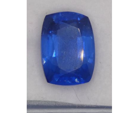 A heated treated and enhanced natural cushion shape sapphire, 10.65 cts, certificate. 