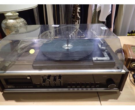 Duette music system with eight track stereo. All electrical items in this lot have been PAT tested for safety and have passed