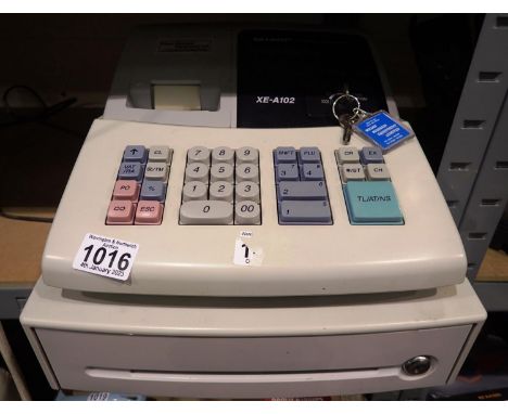 Sharp cash register XE-A102. All electrical items in this lot have been PAT tested for safety and have passed. This does not 