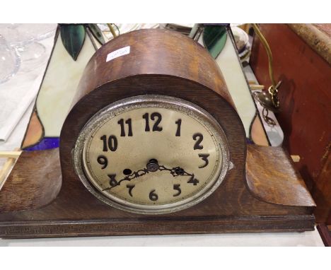 Oak chiming mantle clock, lacking pendulum and glass. Not available for in-house P&amp;P 