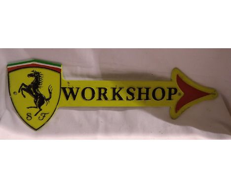 Cast iron Ferrari workshop arrow, W: 35 cm. P&amp;P Group 1 (£14+VAT for the first lot and £1+VAT for subsequent lots) 