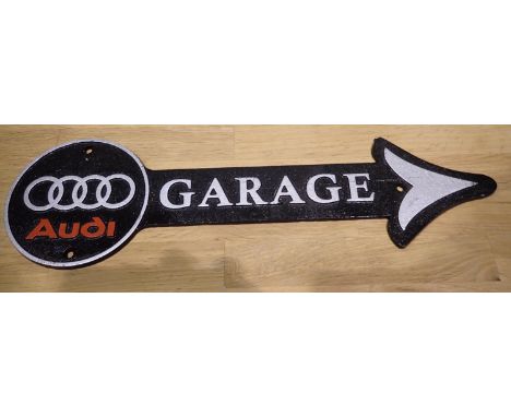 Cast iron Audi garage arrow, W: 35 cm. P&amp;P Group 1 (£14+VAT for the first lot and £1+VAT for subsequent lots) 