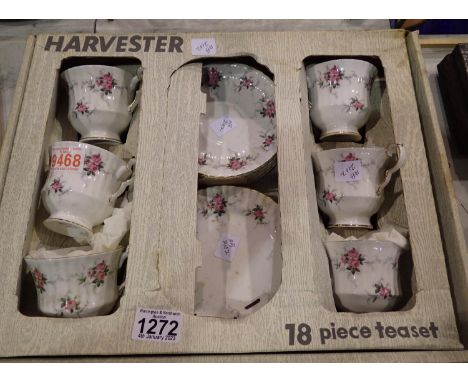 Eighteen piece Royal Windsor China tea service in the Cottage Roses pattern. Not available for in-house P&amp;P 