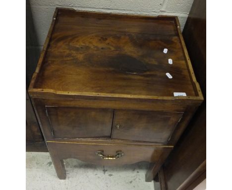 A late George III mahogany tray top night table with two cupboard doors over a commode drawer with ceramic liner