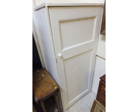 A Victorian white painted single door hall cupboard and an oak oval gate-leg barley-twist occasional table