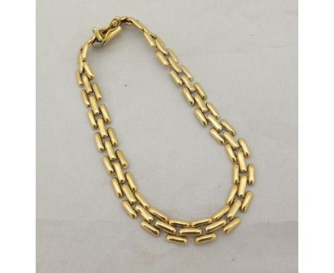 An 18 carat gold stylised gate-link bracelet, approx 10g total