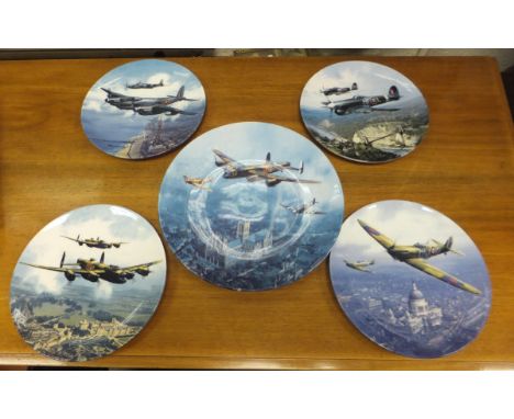 A box containing a collection of Royal Doulton collector's plates from "The Heroes over Home Territory" series, together with