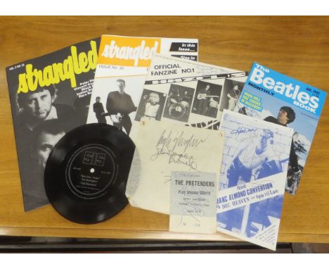 A selection of "The Beatles Monthly Book" magazines, together with various concert ticket stubs, including The Pretenders, et