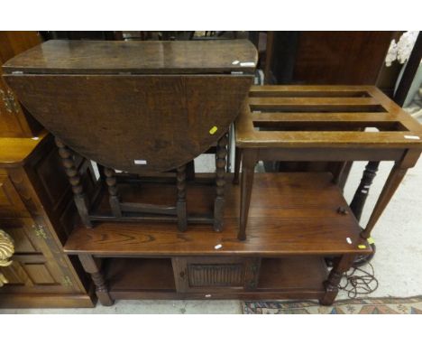 An oak oval gate-leg table in the 18th Century manner, together with a luggage rack