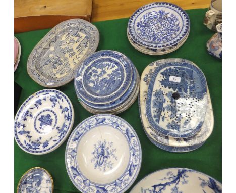 A collection of 19th Century and later English pottery blue and white wares to include a 19th Century Spode drainer decorated