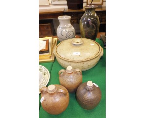 A collection of Winchcombe art pottery wares to include large circular lidded tureen, three small stoneware ewers, a baluster
