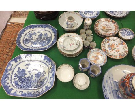 A large collection of 18th Century and later Chinese porcelain to include a blue and white meat plate decorated with pagodas 