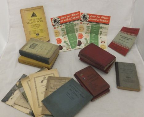 A box containing assorted early 20th Century military manuals, to include Field Service Hygiene Notes India 1945, Jaipur pamp
