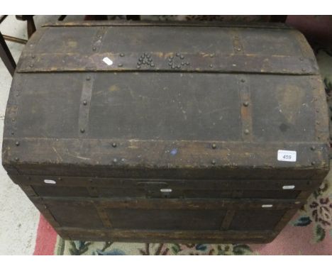 A Victorian canvas covered strapwork decorated and studded dome top cabin trunk
